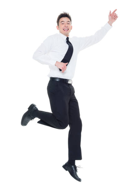istock Handsome businessman with white shirt jumping 931600286