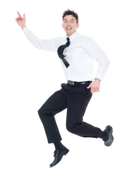 istock Handsome businessman with white shirt jumping 931600748