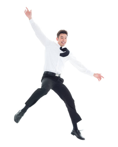 istock Handsome businessman with white shirt jumping 931600802