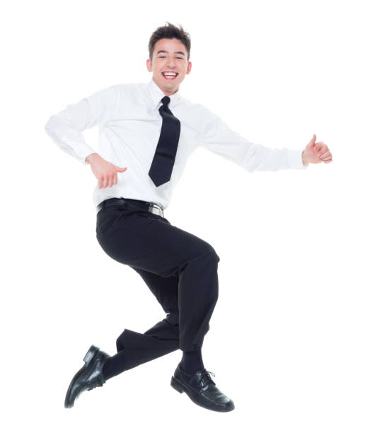 istock Handsome businessman with white shirt jumping 931601108