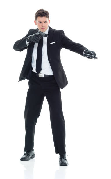 istock Hitman firing two guns 931601406