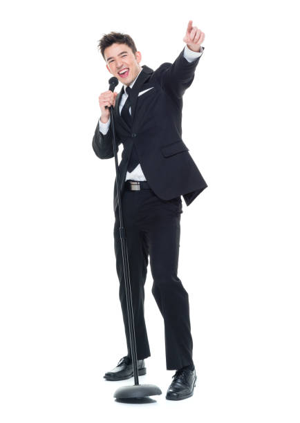 istock Businessman singing into a microphone and pointing 931603714