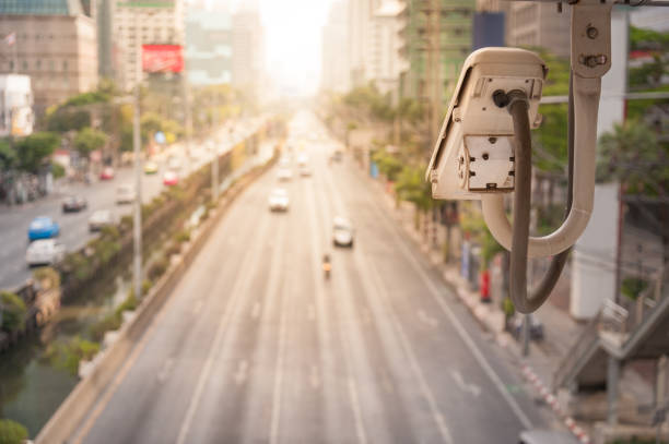 istock Traffic camera observes vehicular traffic on a road 931605174