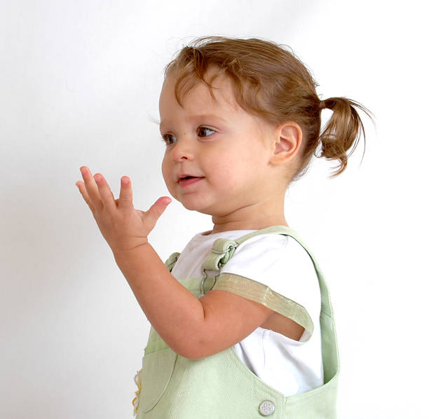 istock Toddler holding up hand 93160525