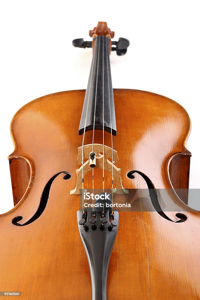 Cello A maple cello, view from below isolated on white. Brown Stock Photo