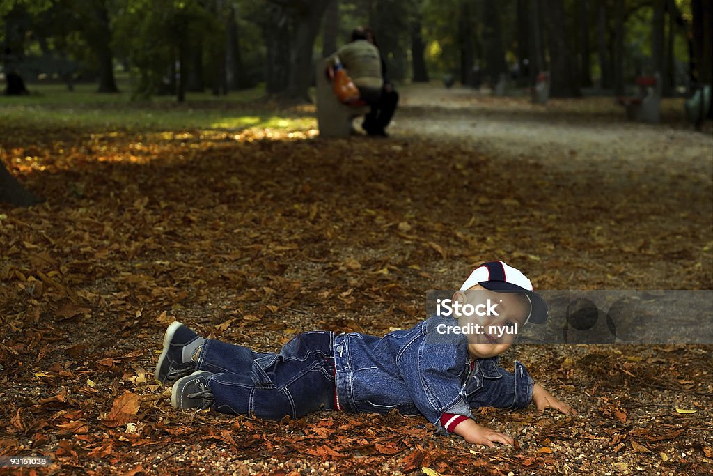 Family in the autumn park  Adult Stock Photo