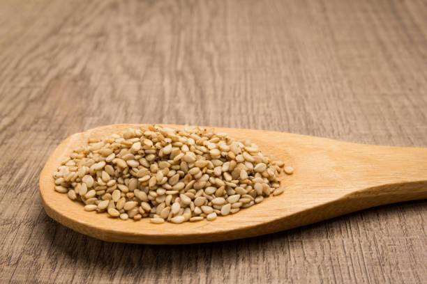 istock Spoon With Beans On Wooden Table 931618670