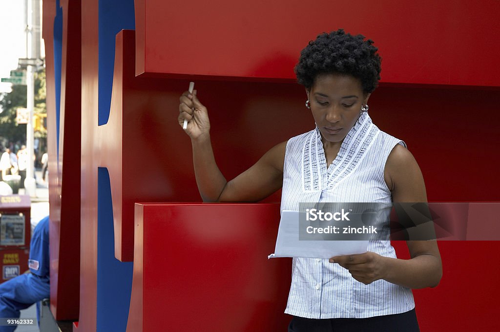 reading the documents  Adult Stock Photo