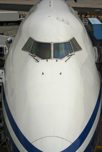 A Jumbo Jet (B747) Parked at the terminal