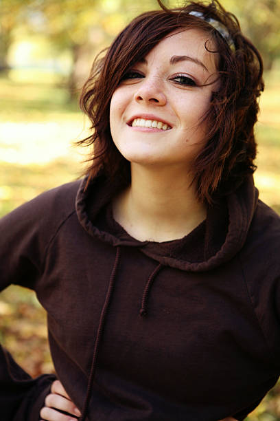 istock Smiling Brunette Girl in the Park 93162540