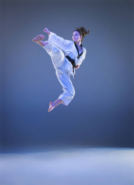 istock The karate girl with black belt 931632612