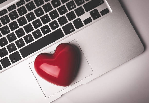 istock High Angle View Of Red Heart Shape On Laptop 931633316