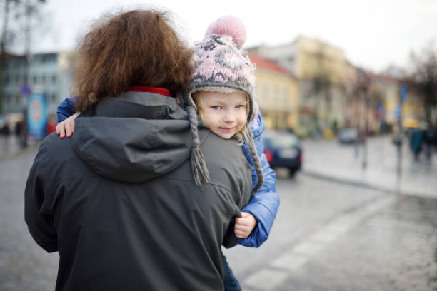 istock Happy young father holding his little daughter 931633638