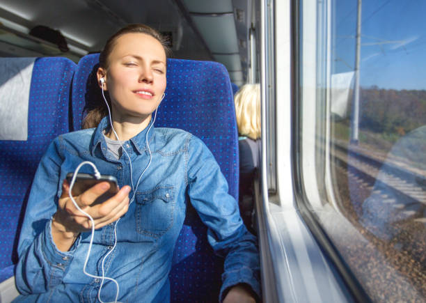 istock Young woman traveling by train 931637530