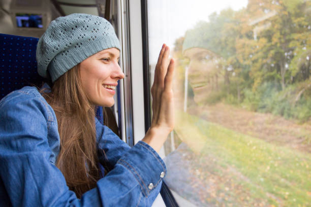 istock Young woman traveling by train 931637562