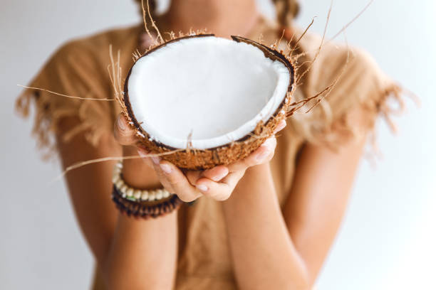 istock Tribal woman with fresh coconut 931637564