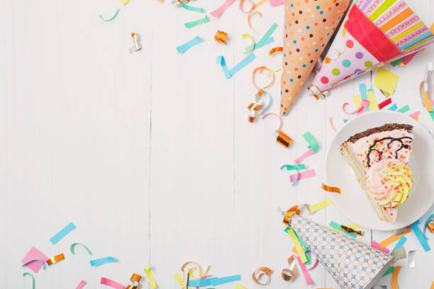 istock birthday cake and  decoration on white wooden background 931640178