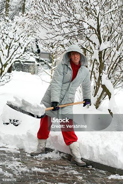 Shoveling Stock Photo - Download Image Now - Cleaning, Snow, Women