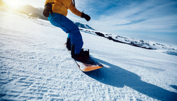 istock one snowboarder snowboarding in winter mountains 931643352