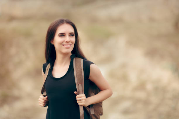 istock Happy Travel Woman With Backpack on a Mountain Trip 931644110
