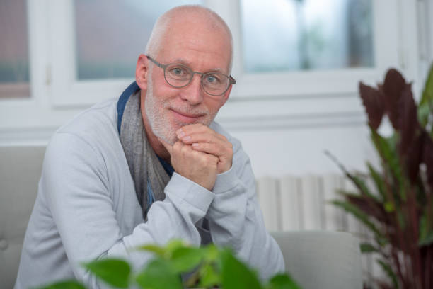 istock portrait of a middle-aged man with a beard and glasses 931644426