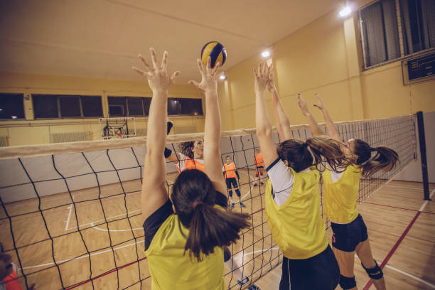 istock Girls volleyball match 931644486