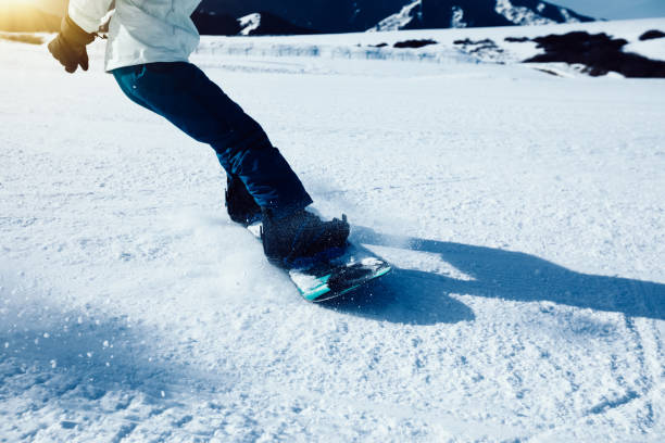istock one snowboarder snowboarding in winter mountains 931644958