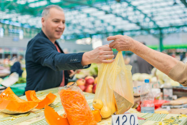 istock Man buying fruit in supermarket 931645354