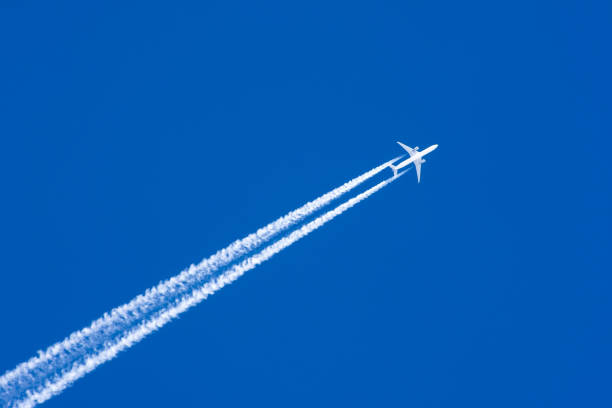 istock White aircraft big two engines aviation airport contrail clouds. 931648168