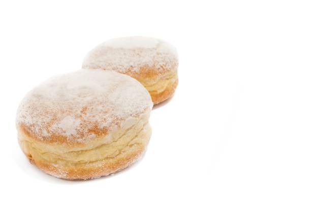 istock Carnival Donut with carnival decoration on a slate 931648548