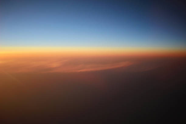 istock the sunset above clouds at the plane 931649652