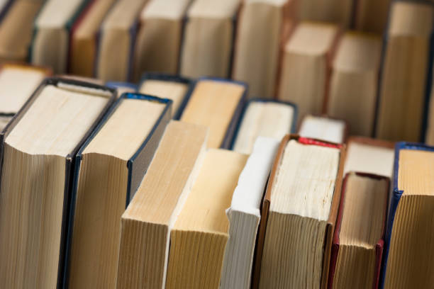 istock Stack of books background. many books piles. 931649806