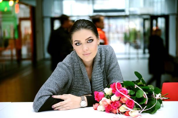 istock Beautiful female sitting in modern cafe. 931656334