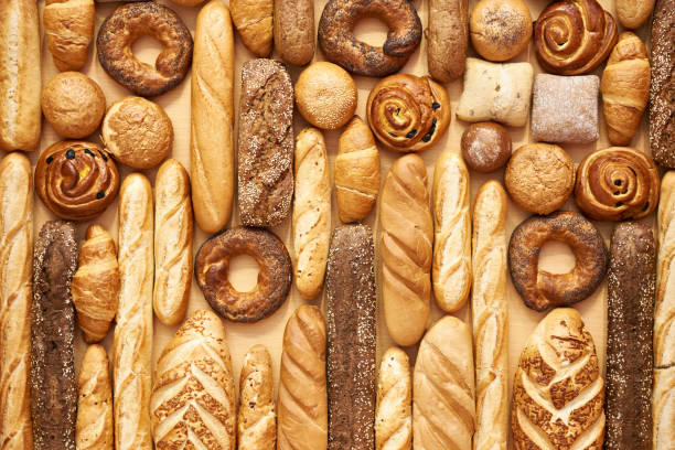bread baking rolls and croissants - pão fresco imagens e fotografias de stock