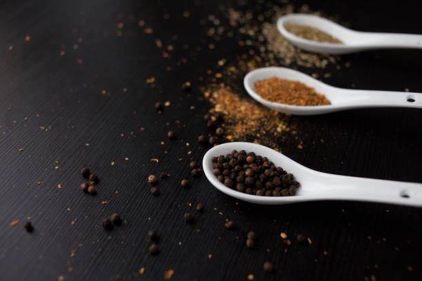 istock Set spices in measuring spoon. Cooking and seasoning for taste 931665906