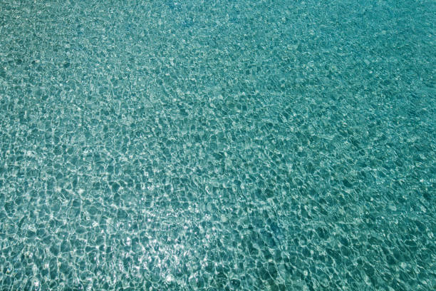 Malaysia: Slight wave motion on clear tropical sea water.