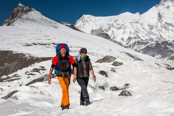 istock Trekkers in Khumbu valley on a way to Everest Base camp 931670604