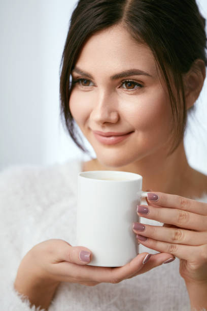 istock Coffee Drink. Beautiful Female Holding Cup With Hot Drink. 931674244