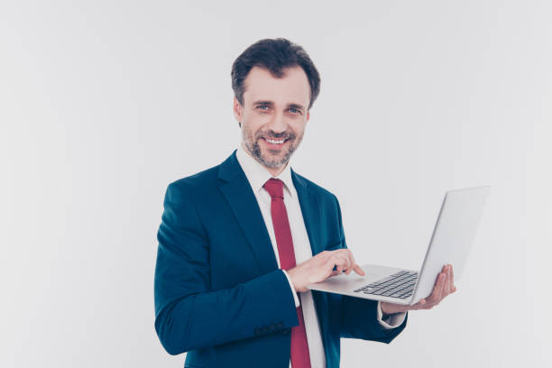 istock People smart clever confident chatting email send receive update fixing download digital concept. Portrait of excited cheerful banker searching information on the internet isolated on gray background 931675346