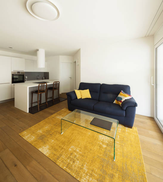 istock Elegant kitchen and living room in modern apartment 931675602