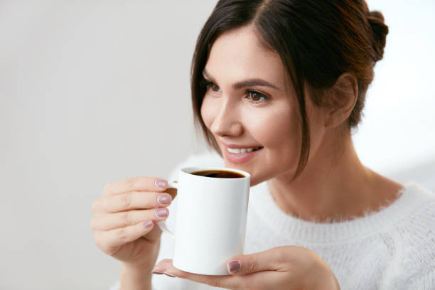istock Coffee Drink. Beautiful Female Holding Cup With Hot Drink. 931677036