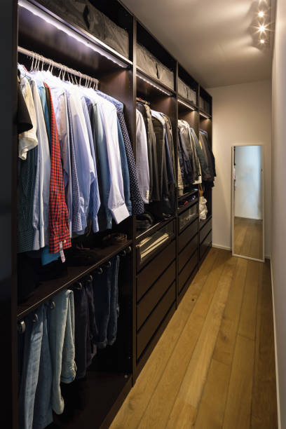 istock Walk-in closet full of clothes 931681854
