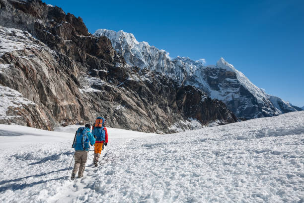 istock Trekkers crossing Cho La pass in Everest region, Nepal 931687008