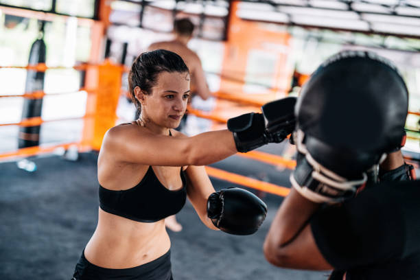 istock Body positive woman on kick boxing training 931688748