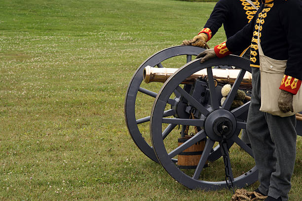 istock Soldiers in the uniform with a canon 93168940