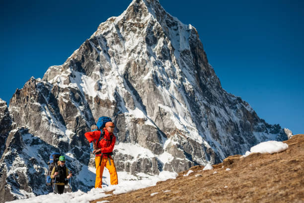 istock Trekkers are in Khumbu valley on a way to Everest Base camp 931691744