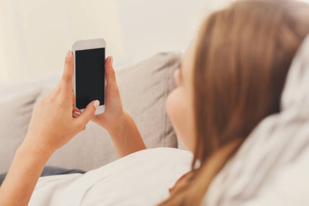 istock Girl at home chatting online on smartphone 931693870