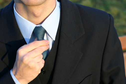 Modern men's clothing in close-up from a composition of high-quality materials.