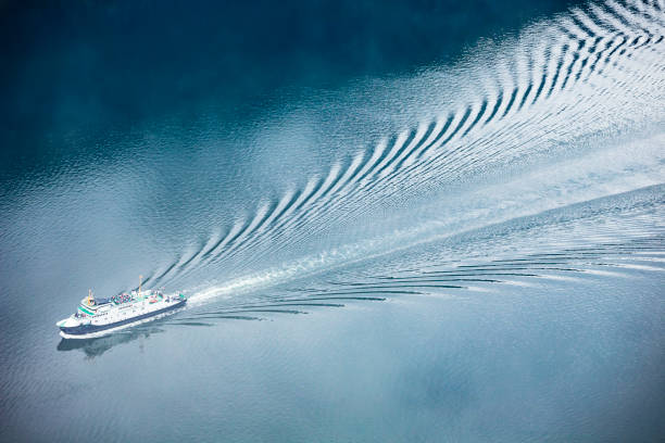 ferry cruise liner on the Geirangerfjord sea wake stock pictures, royalty-free photos & images