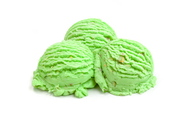 Three pistachio ice cream balls isolated on white background. DSRL studio photo taken with Canon EOS 5D Mk II and Canon EF 100mm f/2.8L Macro IS USM